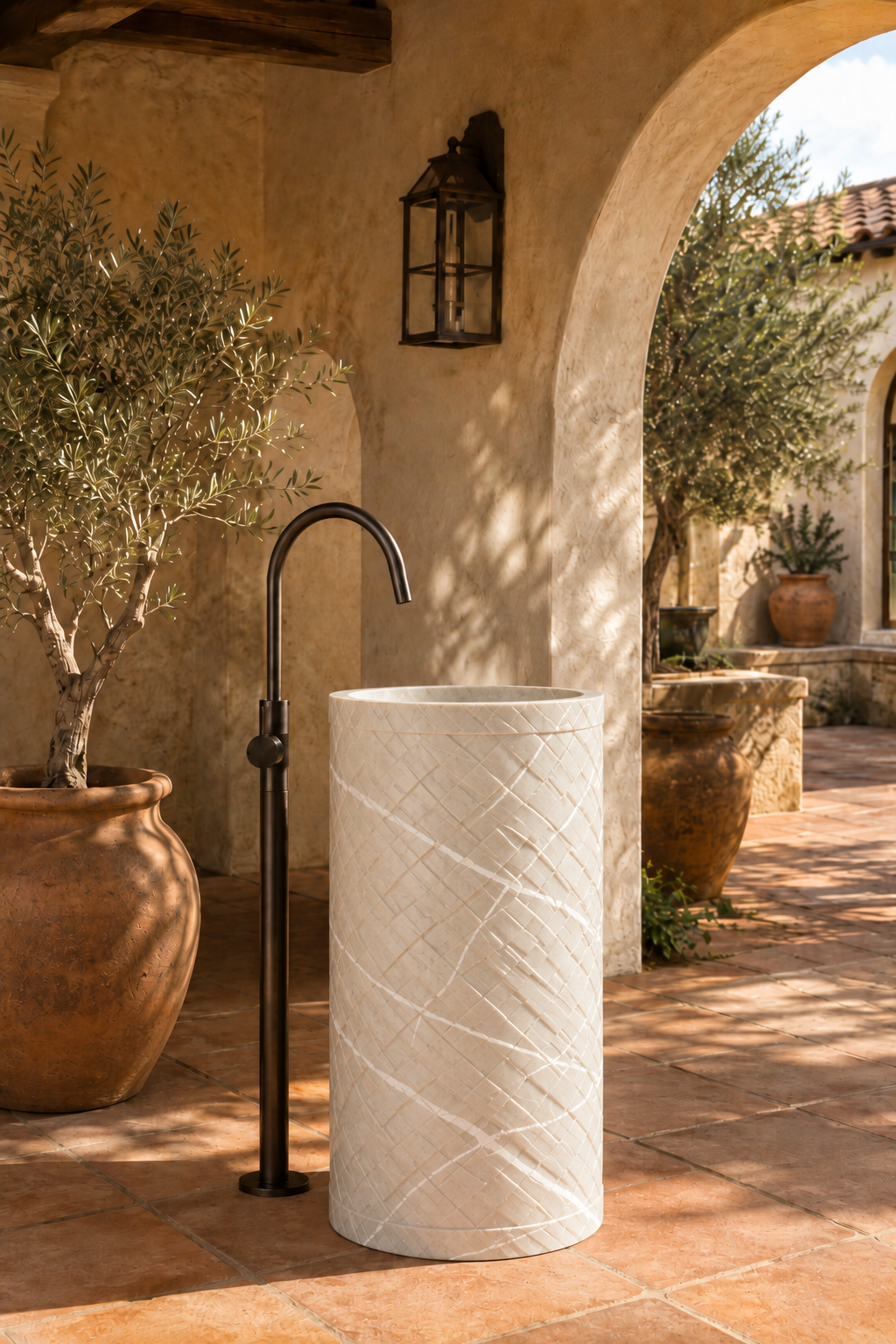 Freestanding Crema Marfil marble sink 